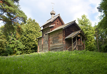 Image showing aging wooden chapel in village