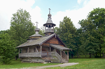 Image showing aging wooden chapel in village