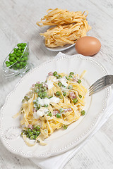 Image showing noodles with cream and ham