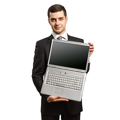 Image showing businessman with open laptop in his hands