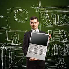 Image showing businessman with open laptop in his hands