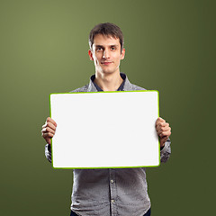 Image showing male with write board in his hands