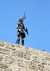 Image showing Knight in armour sky blue on a wall in the Old Rhodes Town in Gr