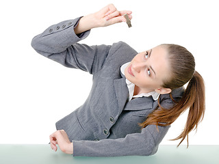 Image showing office manager, a woman examining flash drive