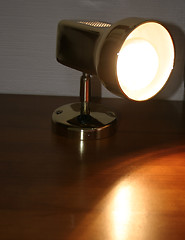 Image showing lit bedside lamp