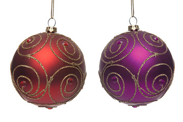 Image showing Two red and purple Christmas balls