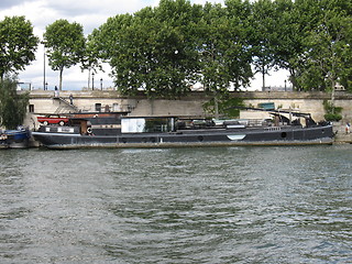 Image showing Houseboat with car on the Seine