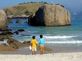 Image showing Brothers in contemplation at the beach