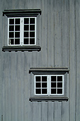 Image showing Two windows on a gray wall
