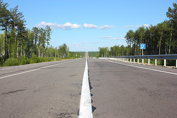 Image showing Asphalt  road and sky with  clouds