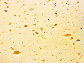 Image showing Background of fresh yellow Swiss cheese with holes