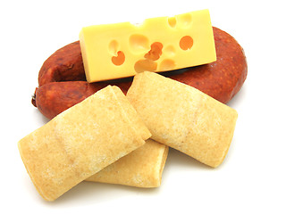 Image showing Rolled pancakes with cheese and sausage