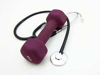 Image showing Stethoscope and dumbbell