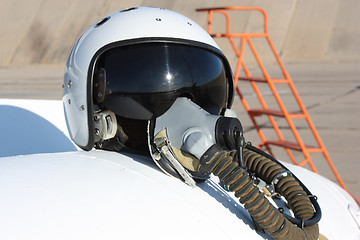 Image showing Protective helmet of the pilot against the plane 