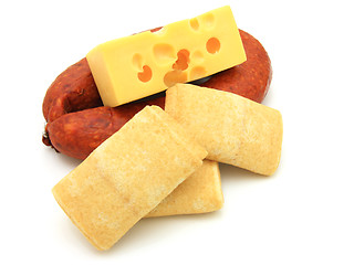 Image showing Rolled pancakes with cheese and sausage