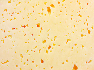 Image showing Background of fresh yellow Swiss cheese with holes