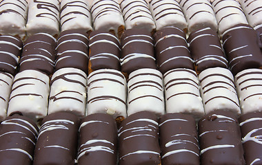 Image showing Round mini chocolate pie with strips from above