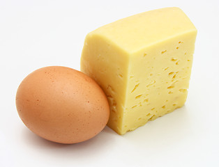 Image showing cheese and eggs, isolated on white.