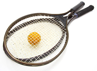 Image showing A tennis ball and racket on a white background