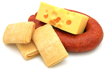 Image showing Rolled pancakes with cheese and sausage