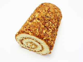 Image showing Fresh swiss roll with poppy on white