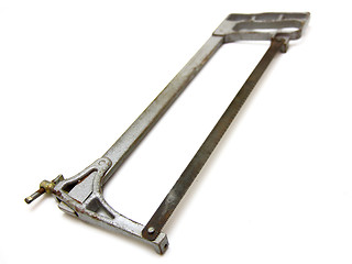 Image showing The old hacksaw on metal 