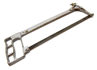 Image showing The old hacksaw on metal 