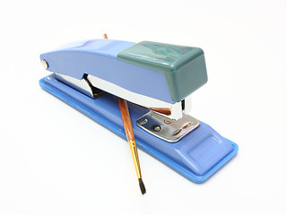 Image showing Stapler and brush 