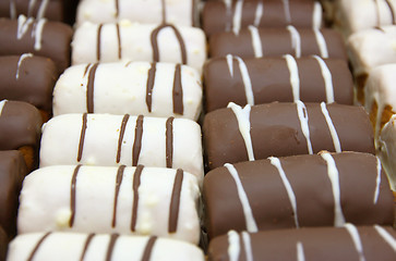 Image showing Round mini chocolate pie with strips from above