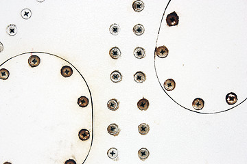 Image showing A silver painted metal aircraft background  with  rivets.
