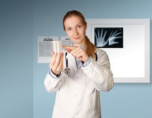 Image showing doctor woman with cup for analysis