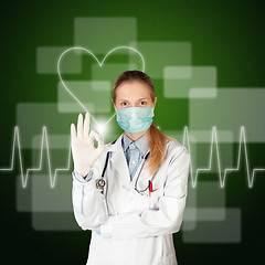 Image showing doctor woman with electrocardiogram