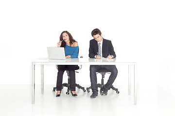 Image showing girl and boy at their office busy working