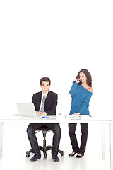 Image showing boy and girl smiling while talking to phone