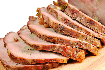 Image showing Roast pork on a wooden board