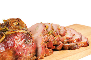 Image showing Roast pork on a wooden board