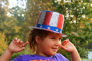 Image showing girl wearing 4th of July top hat