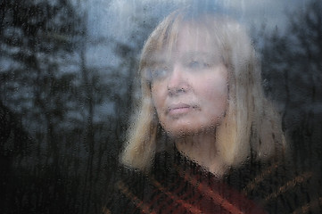 Image showing Portrait of Woman Through the Window