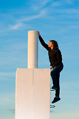 Image showing Reaching out for the top