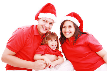 Image showing Happiness family in christmas hat isolated on white