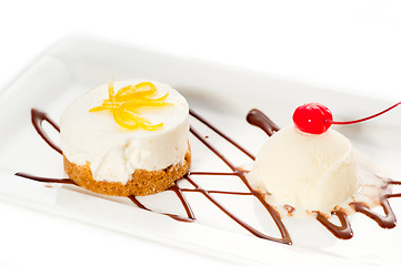 Image showing  lemon mousse served whith lemon peel on top