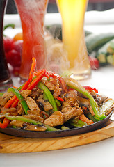 Image showing original fajita sizzling hot  on iron plate