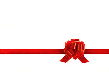 Image showing Ribbons tied with a red bow