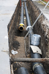 Image showing Installing pipes for hot water and steam heating