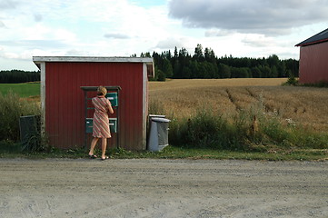 Image showing Checking the mail