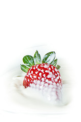 Image showing strawberry splashing into milk