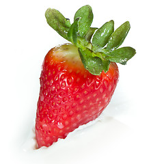 Image showing strawberry splashing into milk