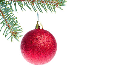 Image showing red christmas ball hanging from tree