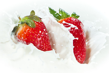 Image showing strawberry splashing into milk