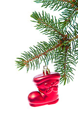 Image showing red christmas star hanging from tree